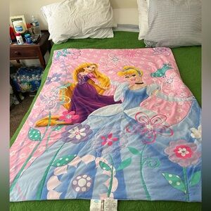 Disney Princesses cinderella and Rapunzel on a very cute throw blanket. 42”x57”